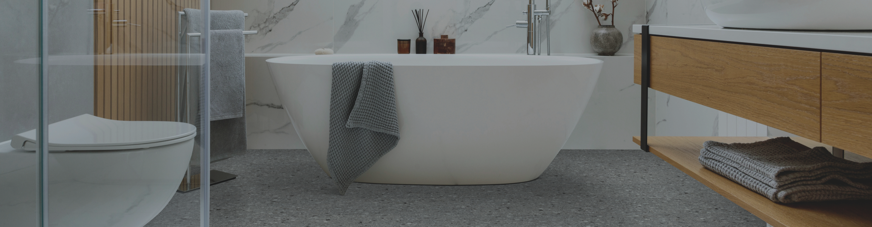 tile flooring in a bathroom with a freestanding tub